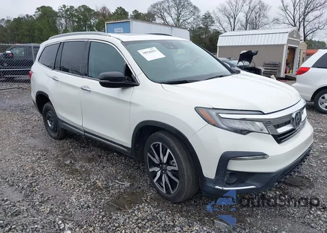 2019 Honda Pilot Touring z USA, uszkodzony, nr VIN 5FNYF5H6XKB037214
